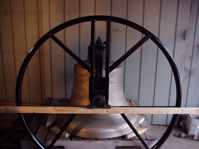 Bell with custom wheel